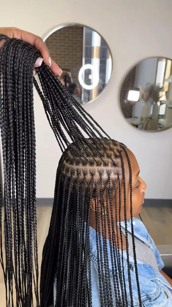 Classic cornrows without extensions showing clean parting