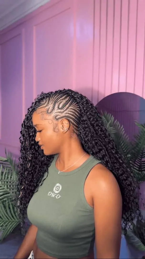 Creative protective styling combining neat cornrows with Mohawk volume — photo 2 at SS BRAIDS GH Accra