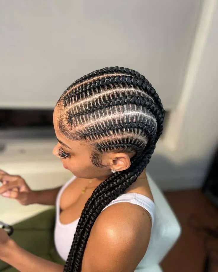 Sleek feed-in stitch braids with clean precise parting lines